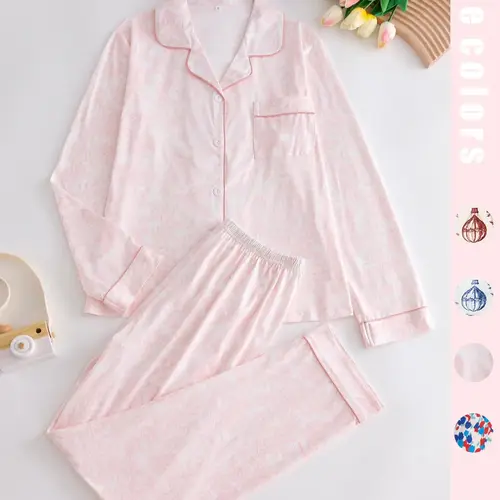 Two-piece pink ladies' pajama set with full-color prints. Button-front collar shirt and elastic waist pants pajama. Casual and comfortable collar long-sleeved top and long pants pajama set. Ladies' pajamas for spring and autumn Loungewear.
