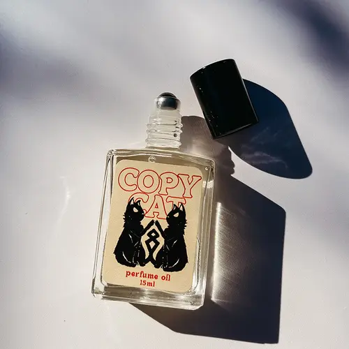 Copycat-Roll on 15ml Oil: Sugar, Vanilla, Cacao, Tonka Bean, Amber, & Musk