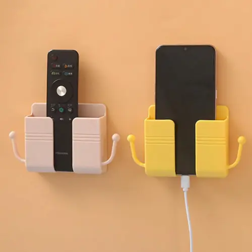 2PCS Mobile phone holder mounted on self-adhesivewall, wall-mounted mobile phone holder with hook andcable clip, wall-mounted mobile phone holder withcharging plug and wall regulator, remote control suitablefor kitchen and living room, (random colors)