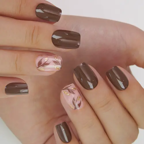 CurvLife Mocha Luxe Press On Nails – Elegant short round nails in deep coffee brown with accent marble art and delicate gold foil details, offering a chic and timeless look that’s easy to apply, strong, reusable and perfect for both everyday wear