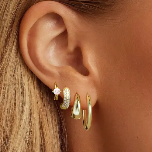 Women's 17KM Small Gold Plated Huggie Hoop Earrings, Lightweight Hypoallergenic Jewelry for Cartilage Piercing, Ideal for Ear Stacking & Jewelry Stack, Gold Aesthetic with Bling Effect
