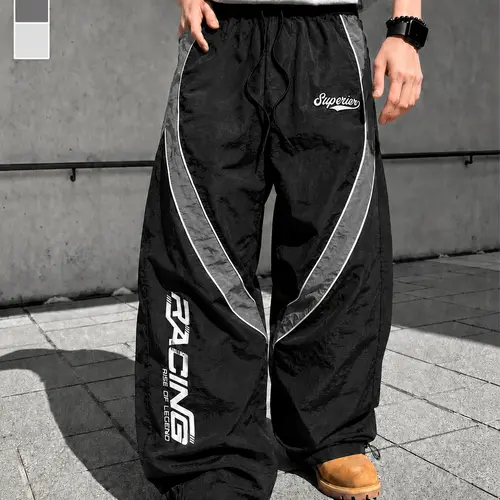 Men's decorative letter print sports pants men's black fabric sports pants with patchwork design featuring letter patterns and pockets, perfect for a casual or active lifestyle.Men's Sports Hoodie Pants Set Gym Clothing Men Black Sport Suit Workout