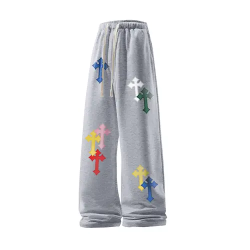 60.1% Cotton 39.9% Polyester Unisex Cross-Print Baggy Sweatpants. Casual Loose Straight Sporty Lounge Pants For Cozy Fall Clothes Transitioning Into Winter Outfits. High Street Vibe Streetwear Trousers For Comfortable Everyday Menswear.