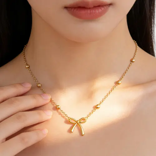 Women's 17KM 14 Karat Gold Plated Bow Choker Necklace - Dainty Tiny Pendant, Adjustable Chain & Link with Lobster Clasp, Bling Effect Gold Plated Necklaces - Adults' Anniversary Trendy Jewelry Gift