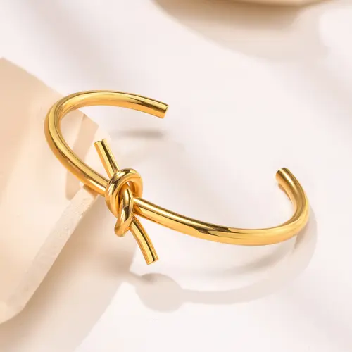 VNOX Gold Plated Knotted Cuff Bangle for Women, Minimalist Stainless Steel Jewelry, Adjustable & Non-Tarnish, Adjustable Cuff, Knotted Bracelets & Bangles