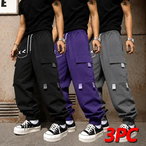 Spring/Summer men’s loose casual cargo pants, wrinkle-resistant and resistant to deformation; drawstring waist design, American letter print, practical multi-pocket construction, retro casual style, suitable for everyday wear and campus outfits;