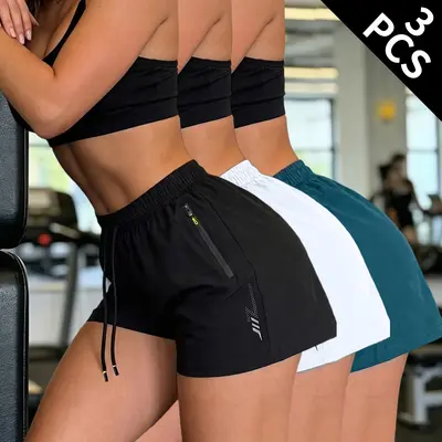 New summer women’s athletic shorts featuring an elastic waistband with drawstring, zippered pockets, and a three-inch inseam; suitable for everyday wear and exercise. Women’s summer apparel set; summer shorts set.