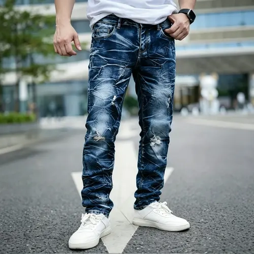 Men’s trendy blue distressed ripped jeans, street style slim fit long pants