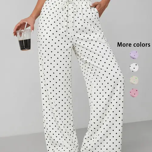 Women’s drawstring elastic-waist polka dot wide-leg pants made from lightweight, soft, breathable fabric; side pocket design; loose, drapey fit; suitable for everyday casual wear and beach vacations; a versatile summer essential.