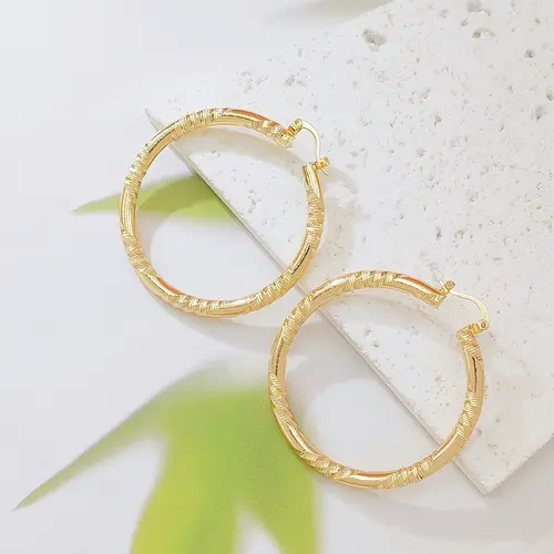 Women's Elegant Twisted Gold Shiny Huggie Earrings - Faceted Diamond-Cut Textured, Lightweight Comfortable Female Costume Jewelry, Earrings for Women for Party & Daily Wear, Gold Shiny Earrings