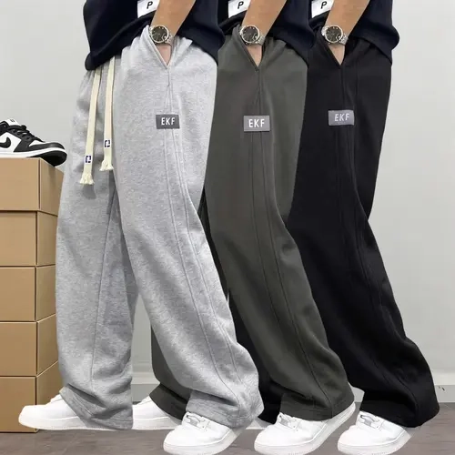 Men’s 3-pack cotton sweatpants with elastic drawstring waist, wide-leg cut, relaxed straight fit, practical side cargo pockets, American street-style trend, versatile casual long pants for everyday commuting, sports, and going out