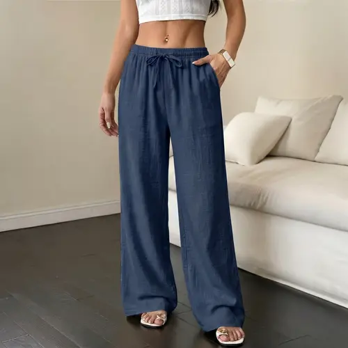 Women’s lightweight solid-color casual pants, couple-style loose fit, 100% polyester fabric, elastic drawstring waist, thin breathable long pants, versatile fashion trousers suitable for vacations and everyday wear.