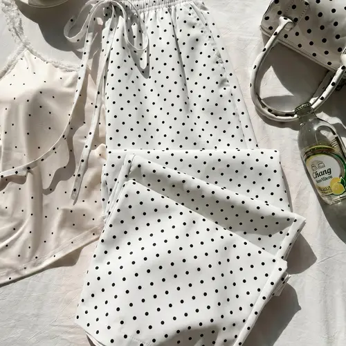 Women’s drawstring elastic-waist polka dot wide-leg pants made from lightweight, soft, skin-friendly fabric; side pocket design; loose, drapey fit that helps conceal curves; suitable for commuting, beach trips, and vacations; a summer wardrobe essential l