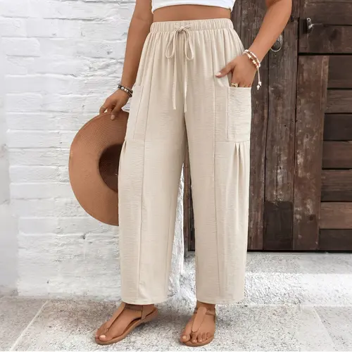 Women’s casual wide-leg nine-tenths pants with an elastic drawstring waist, wrinkle-resistant textured fabric, and pockets—versatile for business-casual wear, suitable for office, home office, brunch dates, and everyday outfits.
