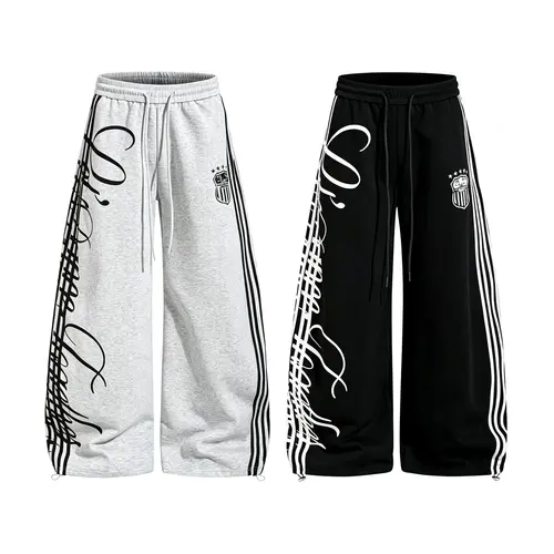 Men’s side stripe wide-leg sweatpants with drawstring waist and script graphic print, loose casual hip hop streetwear jogger pants