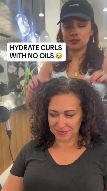 You heard that right! No oils, just two styling products to leave your curls bouncy, juicy, and hydrated 💦💧 💫 Flo-etry mimics your scalp's natural oils for maximum hydration from root to tip  💫 Shook adds more hydration to define curls and reduce frizz  @Urban Bloom Curls #colorwow #curlyhair #curlyhairroutine #curlyhairtechnique #curlyhairmyth #curldefinition 