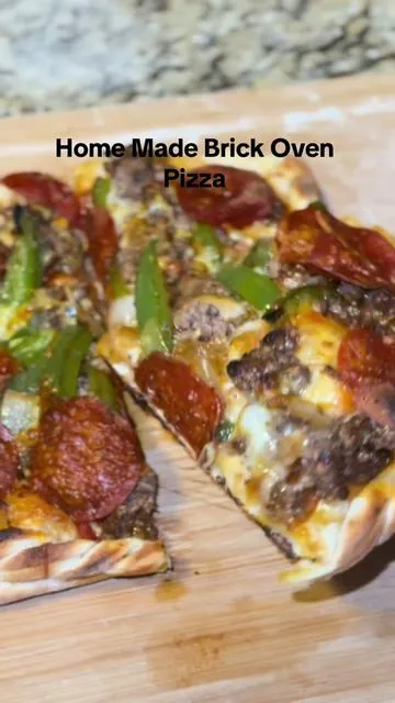 This pizza was so delicious!! One of the best I’ve ever had hands down!! #piezanopizzaoven #granitestone #brickoven #kinfolkskitchen #delicious #dinnerideas #tiktokmademebuyit #fypage #easyrecipes #mealideas 