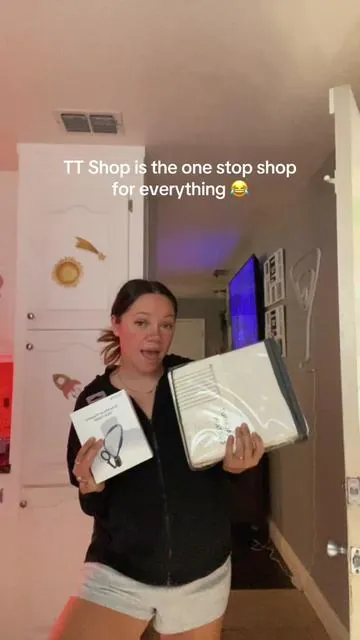 Blackout curtains to neck tripod thing? 🤣🤣