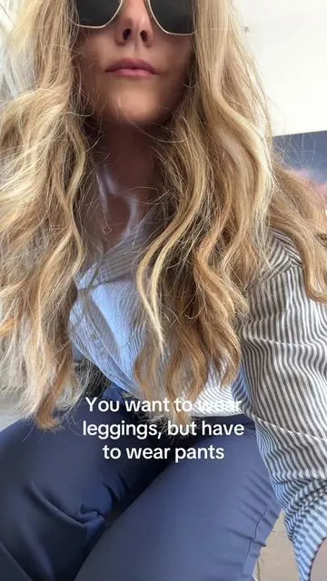 Its giving corporate mom walking in the airport 