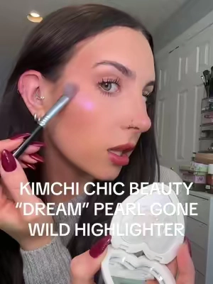 NEW “dream” Pearl Gone Wild highlight from @KimChi Chic Beauty ! This was originally in the sold out Trixie BFF4EVER collection in a half pan- its now back in a full size! ✨ chrome with a gold/ pink shift ✨ gelée formula glides on skin ✨ wear on cheeks, eyes, lips, etc #pearlgonewild #pearlgonewildhighlighter #kimchichic #kimchichicbeauty #kimchichicpearlgonewild #affordablehighlighter #affordablemakeup #makeuprecomendation #goldhighlighter #highlighterrecommendation #beautydeals #glowyskin 
