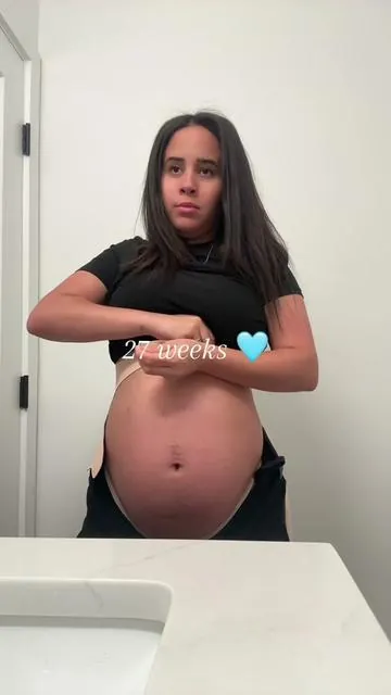 How is your bump looking like!? 27 weeks and in full nesting mode, belly band to the rescue after spending the night going thru baby clothes 😅 #momcozybra #tiktokshop #momcozy #nursingbra #sahm #momcozyshop #27weeksbump #27weeks #thirdtrimester #babyboy #boymom