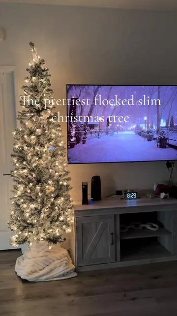 The prettiest flocked slim christmas tree!! I absolutely LOVE it! Also its baby approved:) 🎅🏼🌲✨ #fyp #foryou #christmas #christmastree #boymom #babyboy #slimtree #pretty #mama #family 