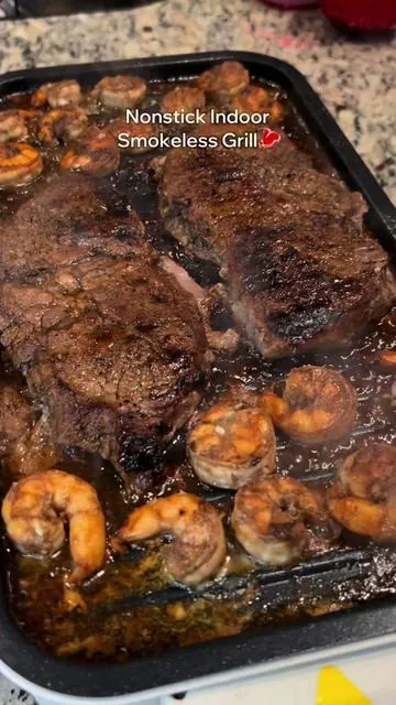Surf and turf on my new indoor electric grill😋 #smokelessgrill #indoorgrill #grillingseason #kitchengadgets #grilledsteak #giftguide #tiktokshopholidayhaul #electricgrill  How to cook a steak Indoor grill recipes  Kitchen appliances  Kitchen gadgets  TikTok shop finds Summer ready Cooking dinner ideas Indoor grill black people recipes Steaks on grill Grilled shrimp Nonstick grill Smokeless grill  Christmas gift ideas