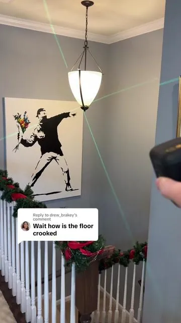 Replying to @drew_brakey Is my floor crooked? Lets use the laser level from @Fanttik to find out! This is the Fanttik D2 Cross Laser Level and it gives you a perfectly straight horizontal and vertical line. This is great for building, hanging shelves, pictures, artwork, tons of stuff! #fanttik #fanttikstyle #laserlevel #consctruction #diy #shelves #remodeling #decorating #tiktokshopholidayhaul #tiktokshopcreatorpicks 