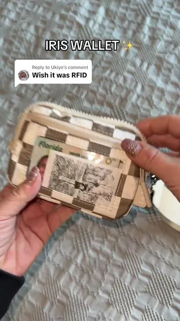Replying to @Ukiyo yesss #iris #iriswallet #pursecollection #musthave #cardwallet #momtok #pursetok #travellife #TikTokMadeMeBuylt #wallet #musthave #viral #ttshop #theiriswallet #chapstick #rfidwallet #rfidblocking 