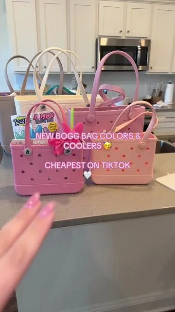 The new Bogg bag colors are so pretty 😍 #boggbag #boggbags #boggbagxl #boggbagsizes #boggcooler #summer #summermusthaves #beachbag #tiktokshopbacktoschool 