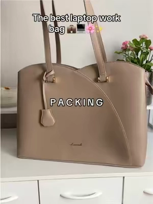 Loving my laptop work bag 💼 It fits all the essentials ✨ AND it’s waterproof @Lovevook Bags  #lovevook #lovevookbags #bag #workbag #bigbag #leatherbag #purse #whatsinmybag #packmybag #packmybagwithme #packing #laptopbag #totebags #aesthetic #largebag #schoolbag 