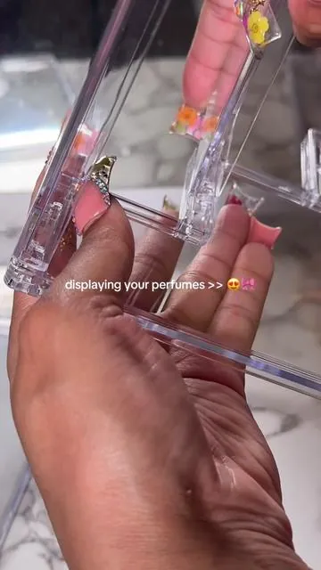 Once I got the hang of it, the stand was actually easy to put together 😅🤌🏽 #perfumetiktok #perfumetok #organizer #displaystand #vanityorganizer #perfume 