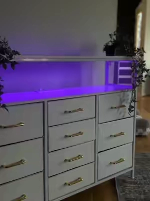 This dresser/TV stand is the perfect way to upgrade #homerefresh #dresser #tvstand #rgblights  