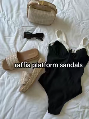 I just found the cutest platform sandals for summer ☀️ i love the raffia detailing on these sandals / slides. These sandals will go perfectly with my summer outfits and are the perfect shoes to slip on for the beach :) #sandals #platformsandals #sandalseason #sandalsforwomen #summershoes #summersandals #sandalslide #slidesandals #raffiasandals 