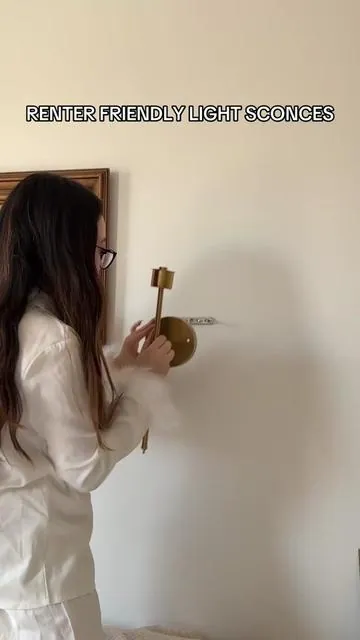 Don’t grab these you won’t regret it. They’re such an easy way to elevate lighting in your home! My New York apartment doesn’t even have a light on the ceiling! No wiring needed and the LED lightbulbs are rechargeable 🤭  #tiktokshoprestock #lightsconce #nycapartment #nycapartmenttour #homedecor #homefinds #nychomedecor 