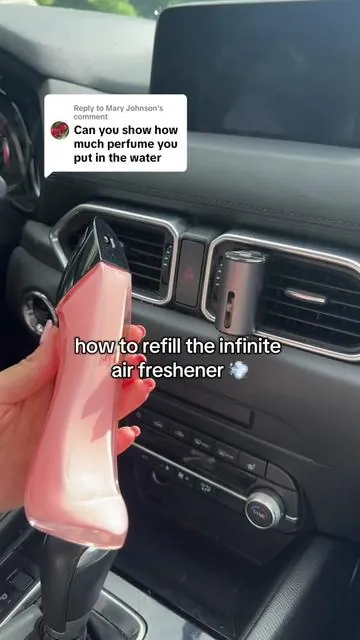 Replying to @Mary Johnson how to refill your air freshener with perfume 🙆‍♀️ #fyp #smartcarairfreshener 