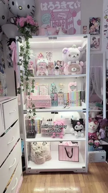 this display cabinet is absolutely gorgeous!! i love the built in leds it just makes everything look so bright and illuminated 🥹!! shop @miifuny  #anime #animefigure #animetiktok #figurecollection  #animefyp #display #displaycase #detolf #cabinet #collector #collection #hobby #shelf #shelves  #cutecore🎀🦴🍮🐾 #kawaiiroom #cutecoreroom #roomtour #bedroom #animeroom #anime #xyzbca #pcsetup #GamerGirl #mechanicalkeyboard #keyboard #mechanicalkeyboards #asmr #aesthetic #GamingSetup #anime #trinkets #girlhood #kpop #setup #fyp #egirl #kawaii #gaming #pinksetup #sanrio #roomdecor #comfortspace #safespace #pinksetup #girly #fortnite #ow2 #valorant #cosplay #steam 