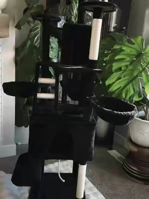 Huge cat tree cat tower perfect for keeping your cat busy with climbing, scratching, and snuggling all in one spot. #CatTree #CatTower #CatFurniture #ActiveCats #CozyCats 