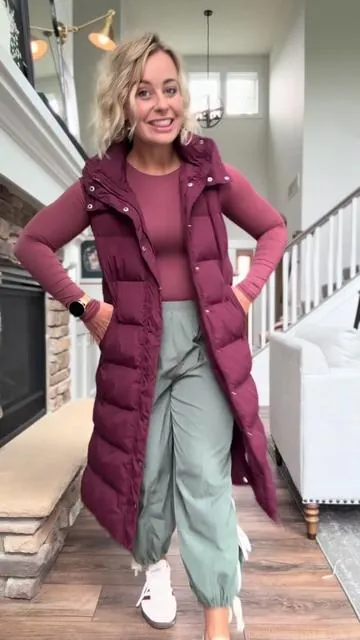 This vest is a 100/10! It sold out last year in a lot of the colors! This vest is so warm it has zippers, buttons, and a hood. The color choices are amazing. I got the wine color and a size small, and it fits true to size.  #vest #pufferjacket #puffervest #ootdinspo #outerwear #styleinspiration #styleinspo #fallfashion #fallaesthetic #fallfashiontrends #winterfashion #coldweather #coldweatheroutfits #longpuffervest @btfbm_us 