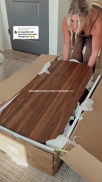 Replying to @Rohia Jobe | Home Decor AND hidden storage!?! 🤭🤎 this coffee table might just be the best thing ever invented ✨ #hiddenstorage #organization #viralproducts #livingeroom #coffeetable 