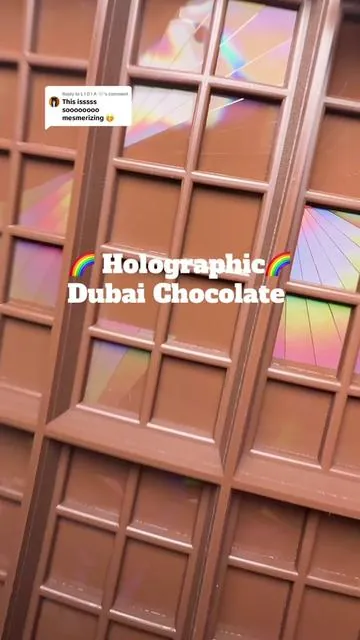 Replying to @L I D I A 🤍   Holographic Dubai Chocolate 🤩🌈🍫 These midsize molds are perfect but definitely less stuffed than the OG chocbox mold. You can definitely make more than 2-3 bars with these molds.  @CHOCBOX ✨  #chocbox #chocboxla #dubaichocolate #pistachiochocolate #holographic #holographicchocolate #holochocolate #dealsforyoudays #ttslevelup 