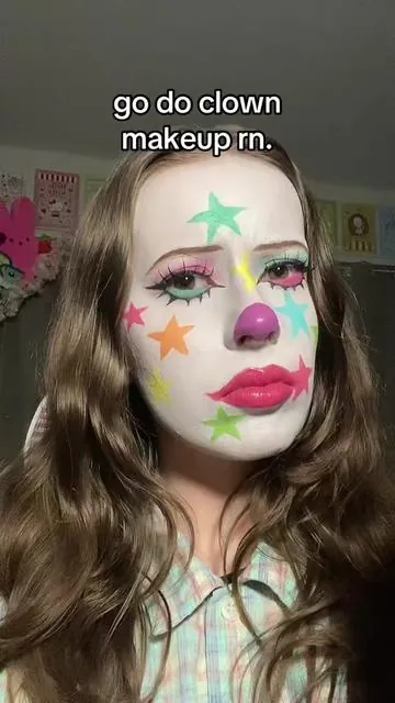 i feel so whimsical and colourful 🙏🙏 #facepaint #makeup #clownmakeup #clown #athenafacepaint 