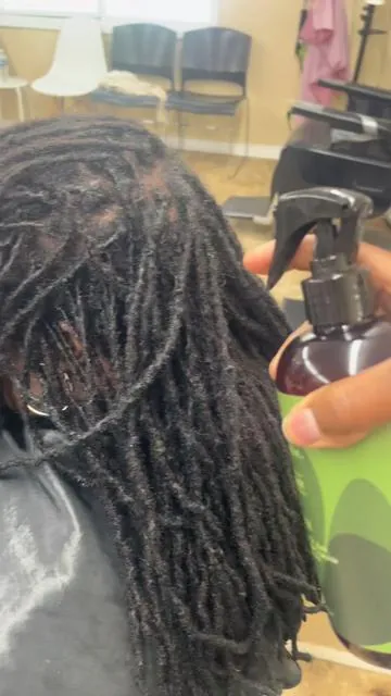 This product is really helping me keep my locs refreshed and from being dry and brittle. #AsIAm #rosemarywater #locs #locmaintenance #locstyles 