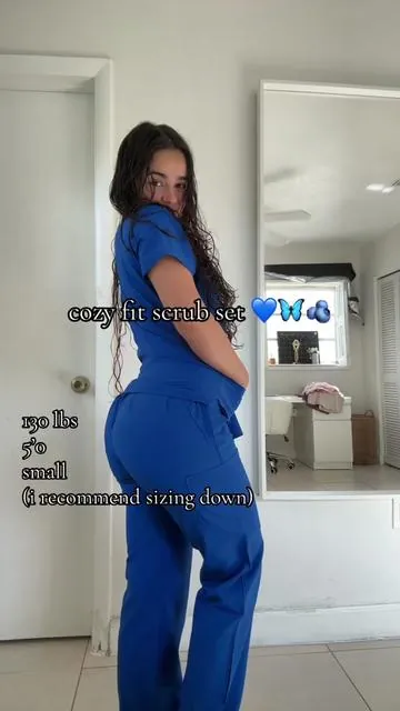 cozy fit scrub set 💙 the material is a little stretchy, they have nice vibrant colors, and they are practical for work :) EVERYONE SAY HI TO COOKIE RIGHT NOW 🤨 #cozyfitscrubs #scrubs #scrubsoftheday #registerednurse #scrubslife 