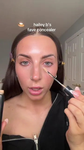the celeb loved concealer for the more natural looking makeup EVER! This stuff is no joke- it covers without creasing, caking, settling, or looking heavy.  I wear fair n to highlight and light w to match @Shop MAKE Beauty  #makebeauty #skinmimetic #concealer #haileybieber #nomakeupmakeup 