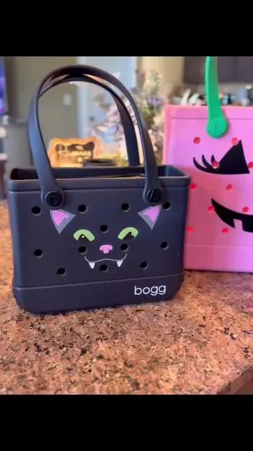 #creatorsearchinsights 🎃👻 Trick or chic? These Halloween Bogg Bags are serving spooky AND stylish. Snag yours before they vanish! 🦇✨ @BoggBags #tiktokshopcreatorpicks  #halloweenstyle #boggbag #totes 