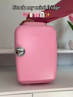 The cutest portable mini fridge 🎀✨ Perfect for drinks, snacks & skincare ✨ #minifridge #skincarefridge #pink #minifridgerestock #restockasmr 