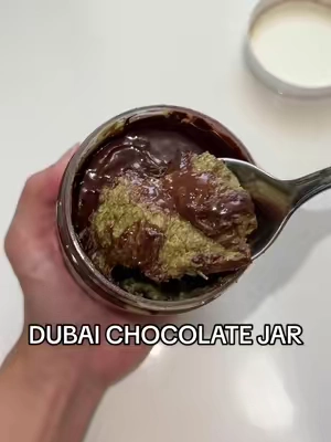 #ad Dubai Chocolate Jar  #dubaichocolate #dubaichocolatejar  Disclaimer: I am not affiliated with Freeze Munch, Dubai Chocolate, or any third-party sellers of this product. I do not manufacture, sell, or ship this item. All opinions shared are my own and provided for informational and promotional purposes only. Product Info: This video features the Freeze Munch Dubai Chocolate Jar. Please review the official ingredient list and product details before purchasing or consuming. Allergen & Ingredient Notice: This product may contain common allergens such as milk, soy, or nuts. Please check the label carefully before consuming, especially if you have allergies, dietary restrictions, or sensitivities. Product Variability: Packaging, product appearance, and availability may change over time. The version shown in this video may differ slightly from what you receive. Always confirm current listings when ordering. TikTok Product Linking: Only the Freeze Munch Dubai Chocolate Jar is intentionally featured in this video. TikTok may automatically recommend or link unrelated products underneath or alongside this post. I am not responsible for any additional products TikTok suggests. Pricing Notice: Any price mentioned is accurate at the time of posting, but may change without notice. Liability: If your order arrives damaged, melted, incorrect, or incomplete, please contact the seller or manufacturer directly to resolve the issue. I am not responsible for shipping problems, storage issues, or dissatisfaction with the product. Original Content: This video is original content created for this promotion and may not be reused, reposted, or edited without my permission.