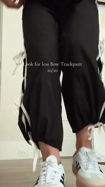 The best look for less!! I’m obsessed with how comfy these bow track pants are. They are true to size and you can adjust the bottom to scrunch or wear wide leg. Short girl approved! UNLINED so perfect for fall! #petitestyle #bowtrackpant 