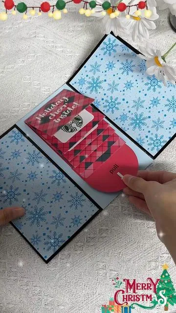 More than a card, it’s holiday surprise! Pull the tab for instant cheer #christmasgifts #diygift #holidaycard #giftdeas #surprise 